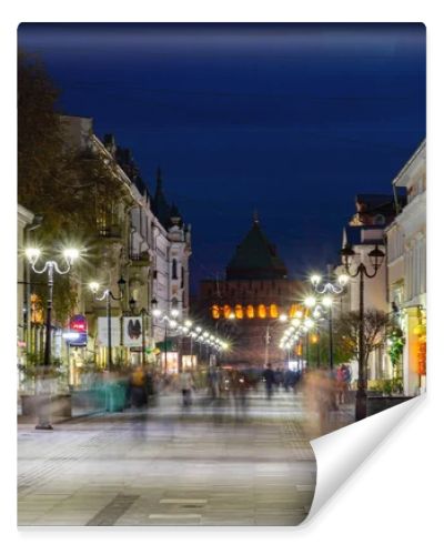 Nizhny Novgorod / Russia - October 16, 2019: Bolshaya Pokrovskaya street. The light of the street lamps. City at dusk. Evening cityscape. Long exposure.