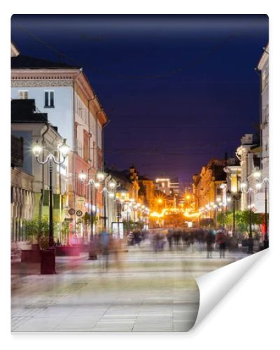 Nizhny Novgorod / Russia - October 16, 2019: Bolshaya Pokrovskaya street. The light of the street lamps. City at dusk. Evening cityscape. Long exposure.