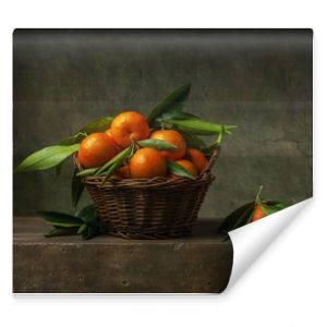 Still life with tangerines in a basket on the table