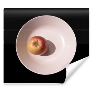 Apple in light brown plate nature morte