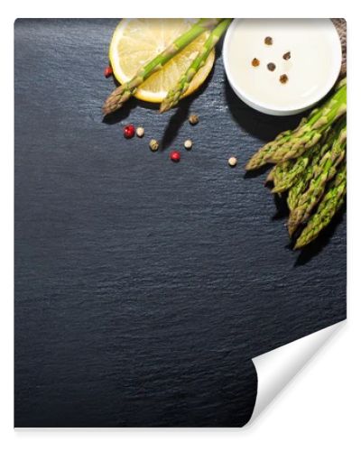 Asparagus on a dark surface. Food background