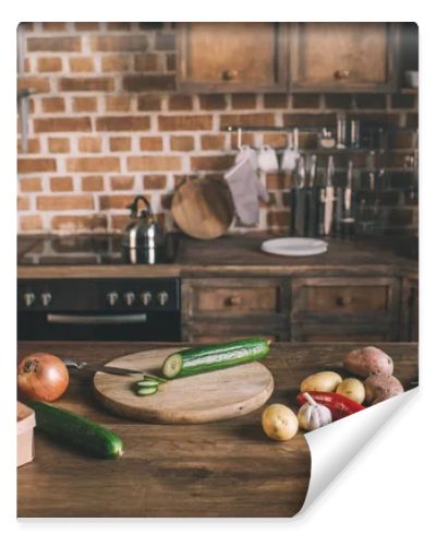 Raw vegetables on kitchen table