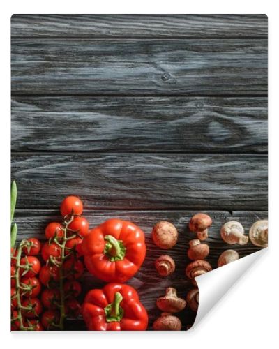 top view of various raw vegetables on wooden tabletop