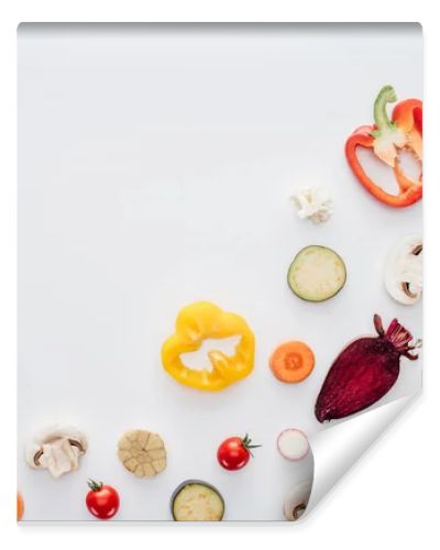 top view of slices of fresh healthy vegetables isolated on white background 