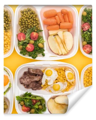 top view of eco packages with apples, vegetables, meat, fried eggs and salads isolated on yellow 