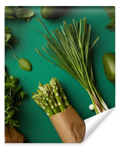 top view of various ripe vegetables on green surface