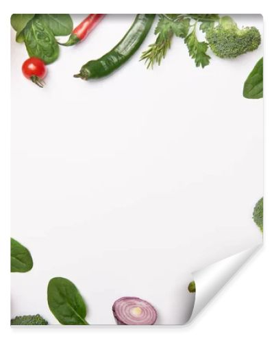 Flat lay with organic vegetables on white background