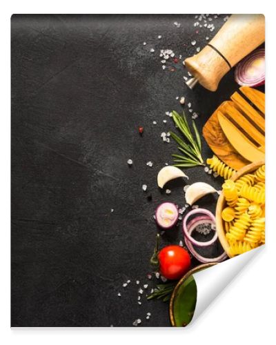 Food cooking background. Italian food, pasta ingredient. Top view on black stone table.