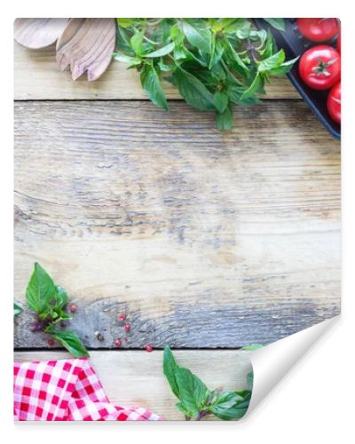 Fresh tasty vegetables for cooking or salad on a rustic background, top view, frame. Diet or vegetarian food concept. Top view.