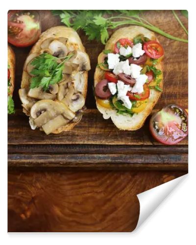 assorted bruschetta with tomatoes, mushrooms and cheese