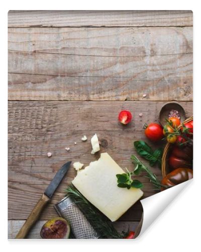 ingredients for tomato pasta on wooden table 
