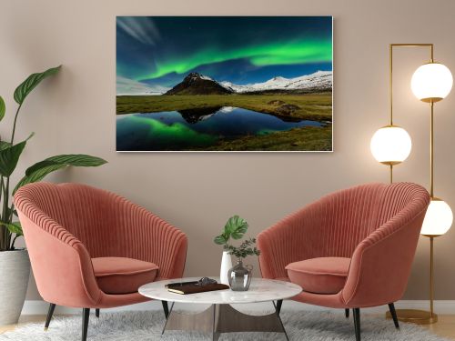 Spectacular aurora borealis near the glacier lagoon Jokulsarlon in Iceland.