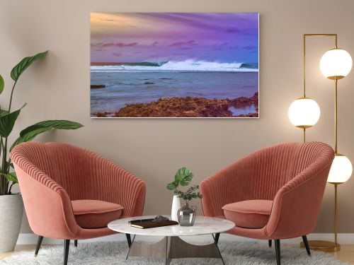 Beautiful sea landscape in early sunset on the background of dramatic cloudy sky and corals. Siargao island, Philippines.