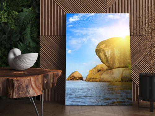 A picturesque cliff on the shore of a tropical sea.