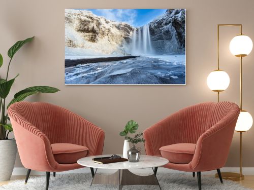 Beautiful Skogafoss waterfall in winter. Iceland.