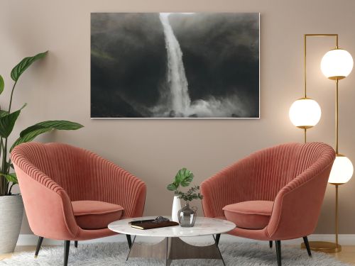 bottom view of Haifoss waterfall with mist around, Iceland