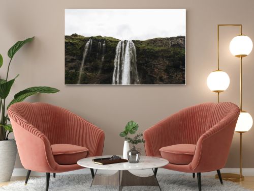 low angle view of Seljalandsfoss waterfall in highlands in Iceland 