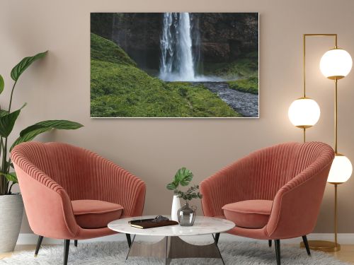 scenic view of Seljalandsfoss waterfall in highlands in Iceland 