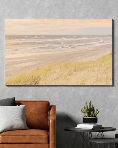 Baltic sea coast (sand dunes) after the storm at sunset. Clear sky, glowing clouds, wind. Autumn landscape. Nature, environmental conservation, ecology, ecotourism, local travel