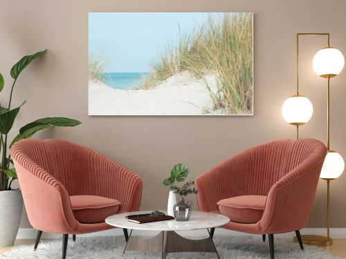 Baltic sea dunes over blue coastline background in Northern Germany