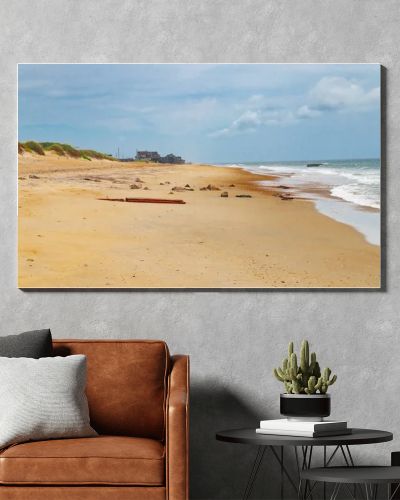 Empty ocean shoreline with cloudy sky and dunes Atlantic coast North Carolina USA