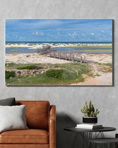 Coastal Wetland Landscape With Wooden Walkway And Sand Dunes in Mari Ermi Cabras