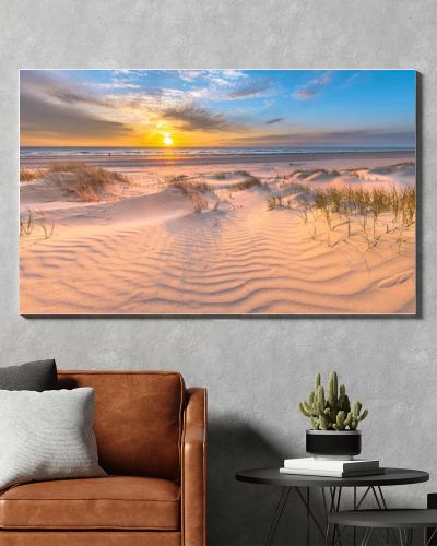 Beach and dunes Dutch coastline landscape seen from Wijk aan Zee over the North Sea at sunset, Netherlands