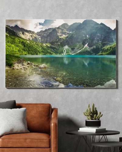 Crystal clear mountain lake and rocky mountains