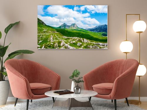 rocky mountains and blue cloudy sky in Durmitor massif, Montenegro