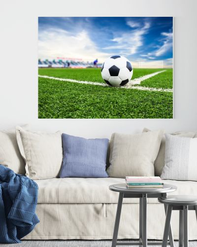 Soccer ball on green field