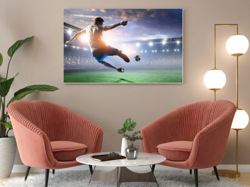 Soccer player on stadium in action. Mixed media
