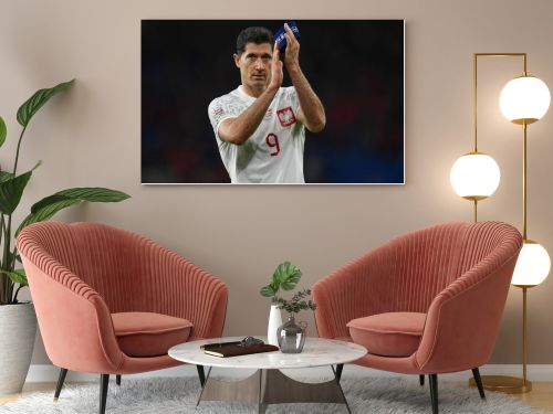 Poland's Robert Lewandowski Applauds the travelling supporters during the UEFA Nations League Group A4 match between Wales vs Poland at Cardiff City Stadium, Cardiff, United Kingdom, 25th September 202