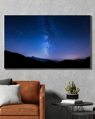 Night sky stars. Milky Way. Mountain background