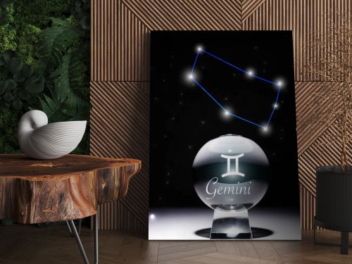 crystal ball with Gemini zodiac sign isolated on black with constellation