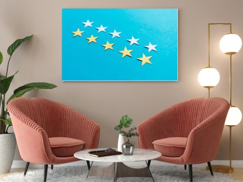 selective focus of white and yellow stars on blue 