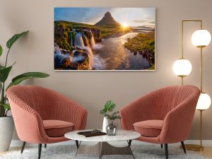 Beautiful landscape with sunrise on Kirkjufellsfoss waterfall and Kirkjufell mountain, Iceland, Europe.