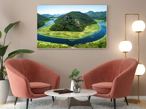 landscape of blue curved Crnojevica River and mountains in Montenegro