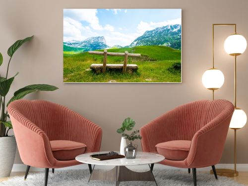 wooden bench with beautiful mountains in Durmitor massif, Montenegro