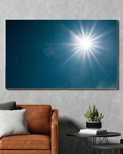 scenic view of bright sun shining in pure dark blue sky, panoramic shot