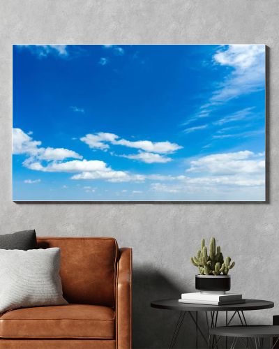 blue sky background with tiny clouds