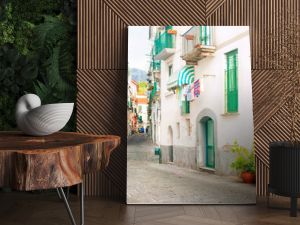 narrow european street with ceramic decorations