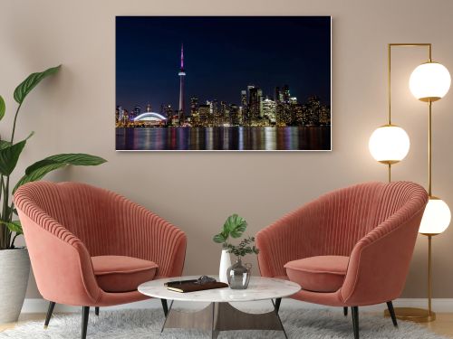 Night View of Downtown Toronto from Toronto Islands with the Lake Ontario, Canada.