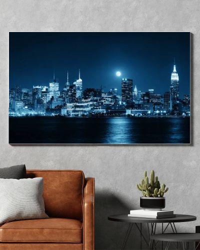 Moon rise over midtown Manhattan with city skyline at night