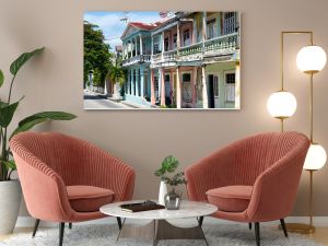 Historic Jamaican buildings in classic Georgian style architecture, lining the streets of downtown Kingston.