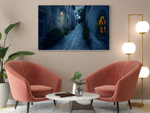 Old narrow town street in Alacati, Turkey