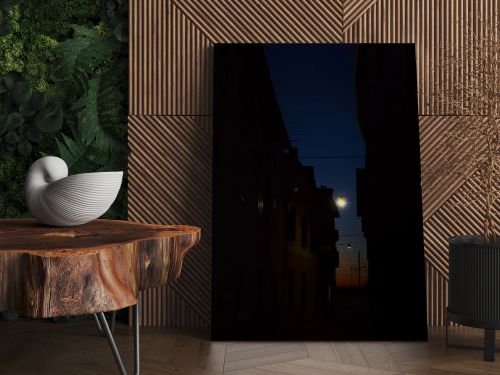 Sky at sunset in autumn framed by buildings