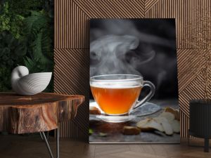 Hot Ginger tea in a glass on wood background.Hot drink . Copy space.