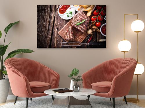 Beef steak on wooden table