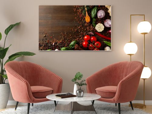 Different cooking ingredients and spices on wooden background