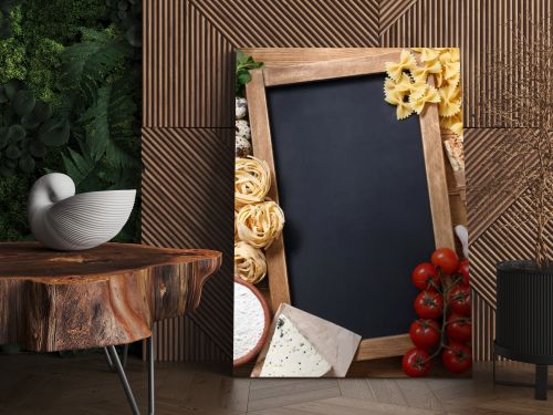 Italian food on vintage wood background with chalkboard